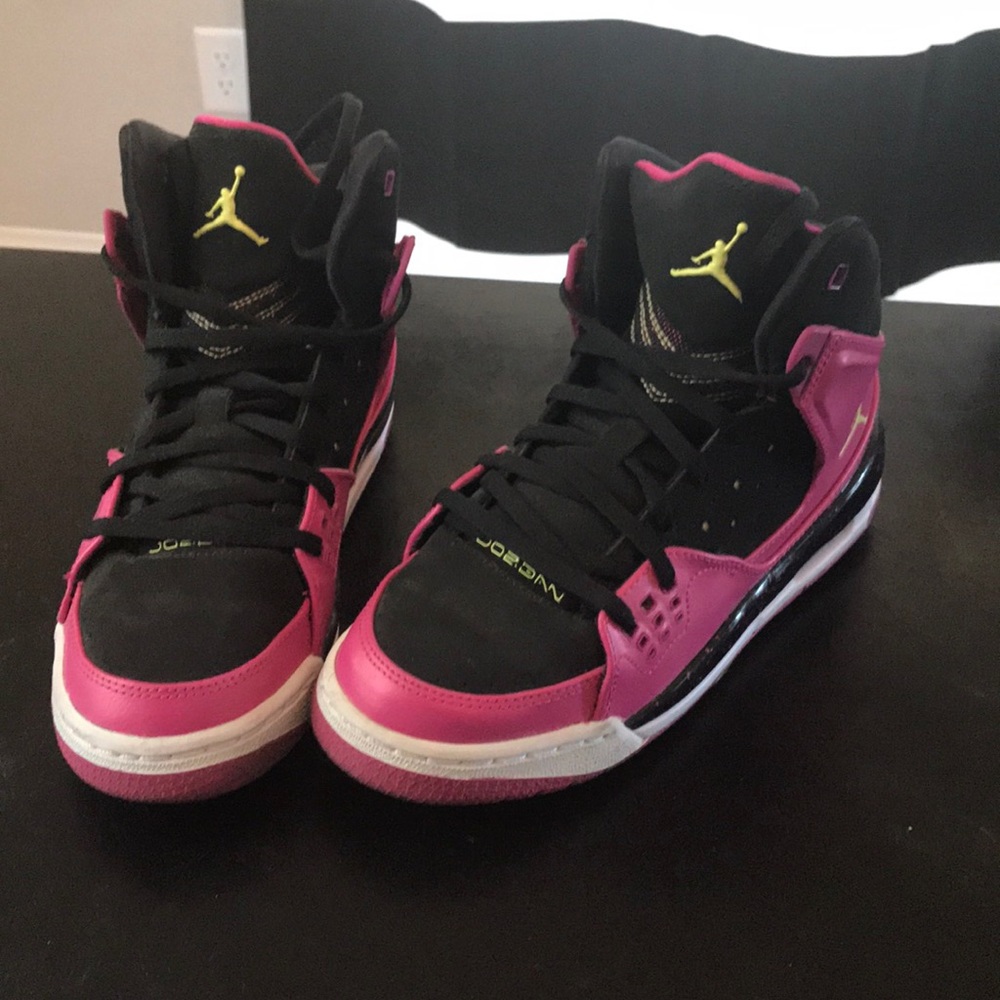 Pink and black Jordan’s